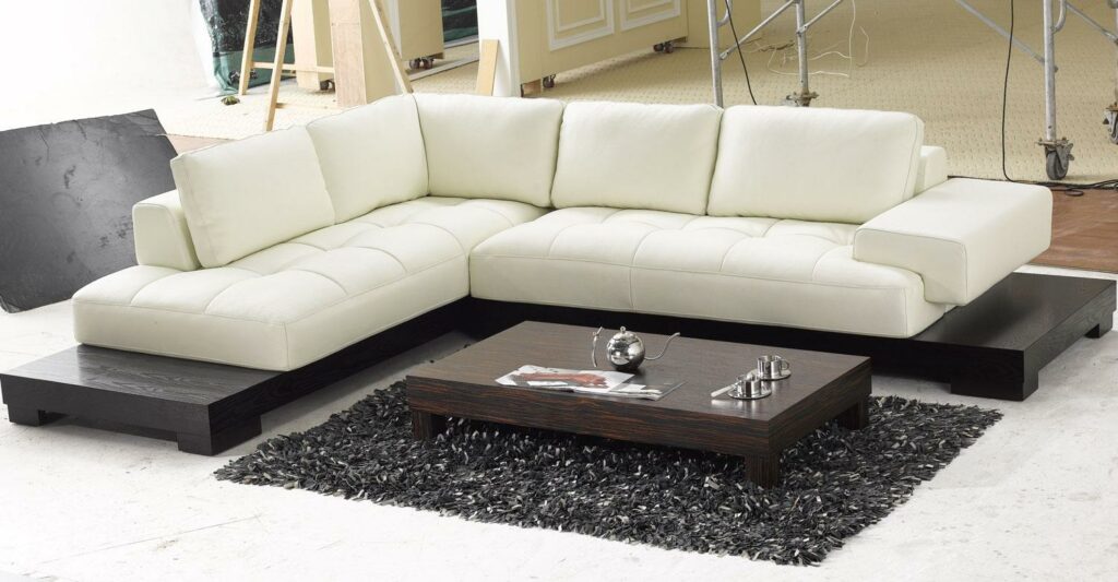 How far should a coffee table be from the couch?