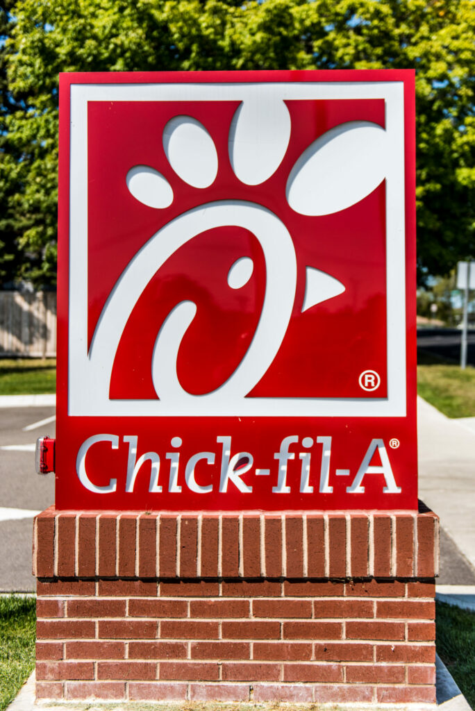 Madison, WI - 13 September 2017:  Chick fil A sign on the side of a street letting customers know where the food is at.