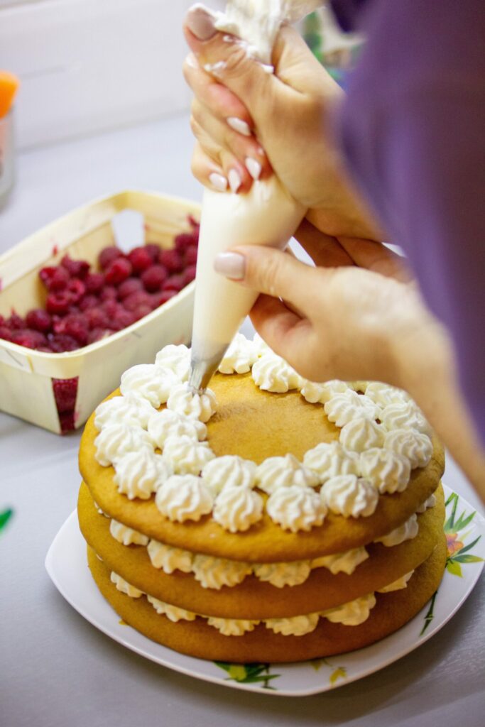 a-woman-is-preparing-a-biscuit-cake-at-the-kitchen_t20_pRbGe1