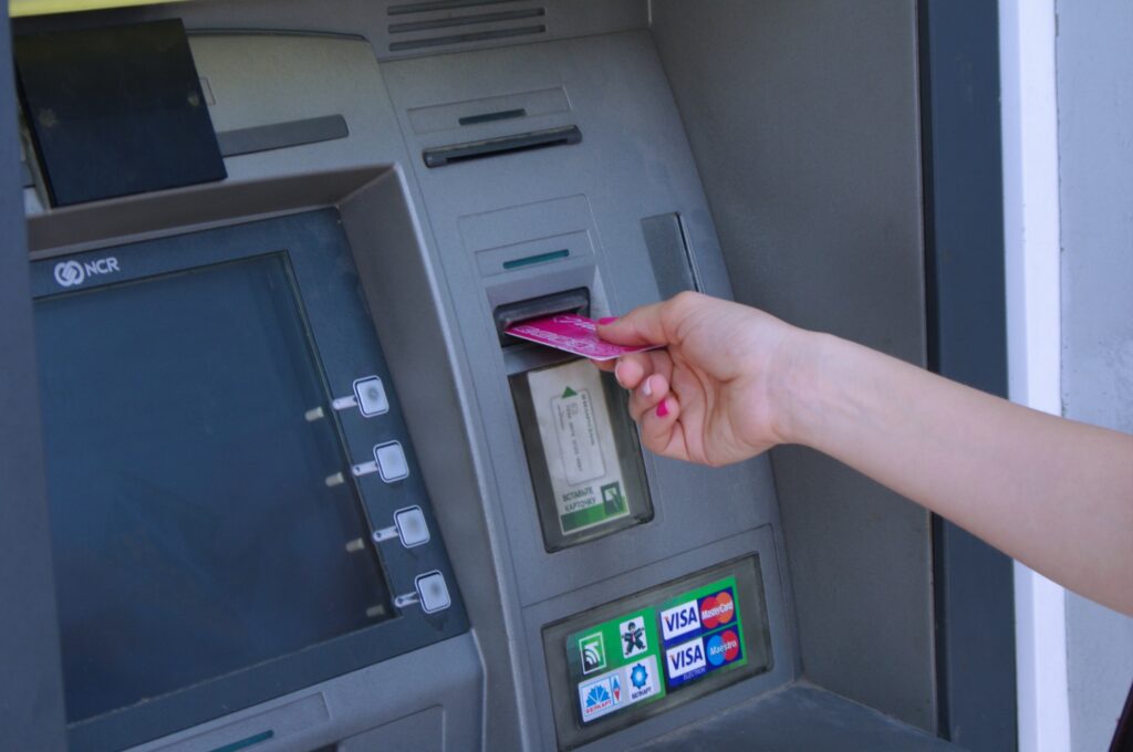 How do ATMs verify checks?