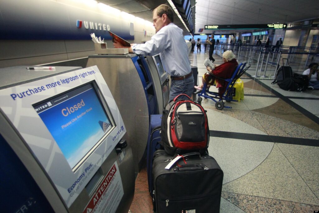 How do checked bag fees work?