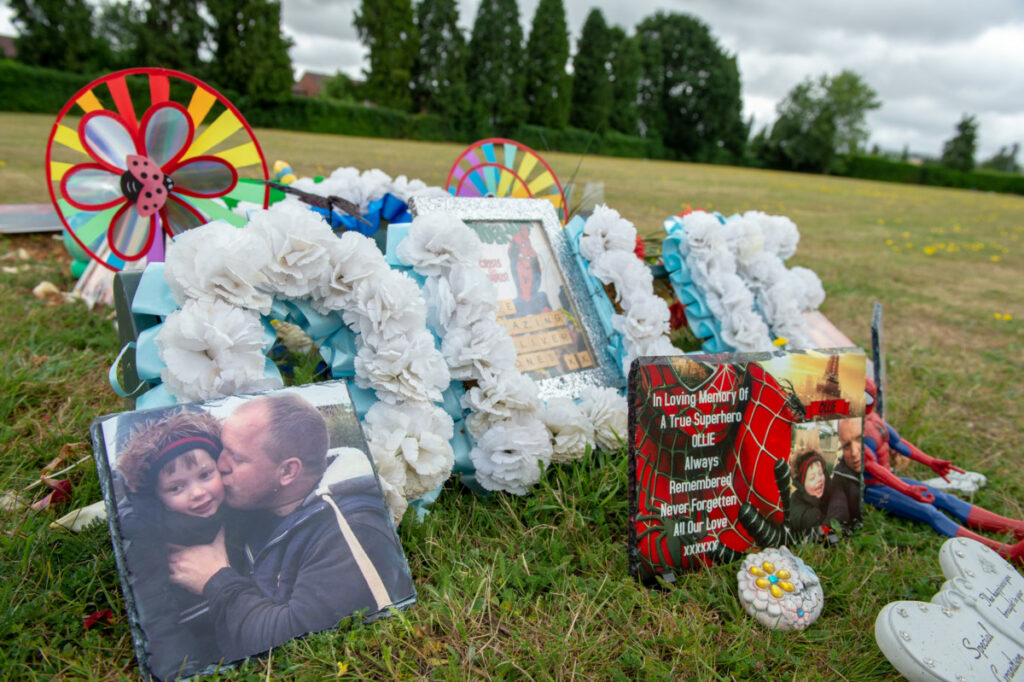 Why do you have to wait to put a headstone on a grave?